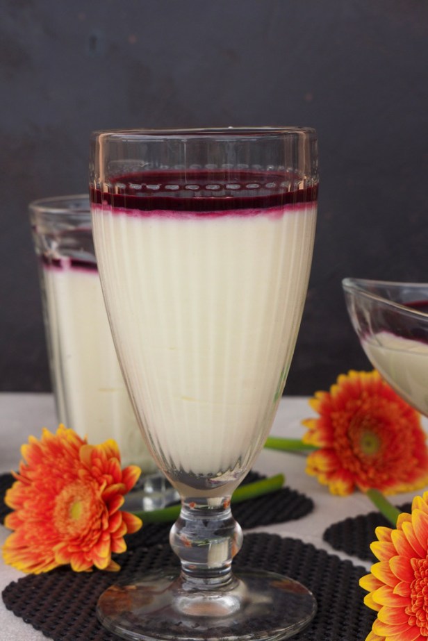 White chocolate coconut mousse with blueberry sauce