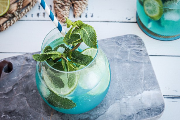 Elevate your summer cocktail experience sipping on a delicious Blue Curacao Mojito